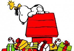Snoopy on his doghouse with Christmas presents
