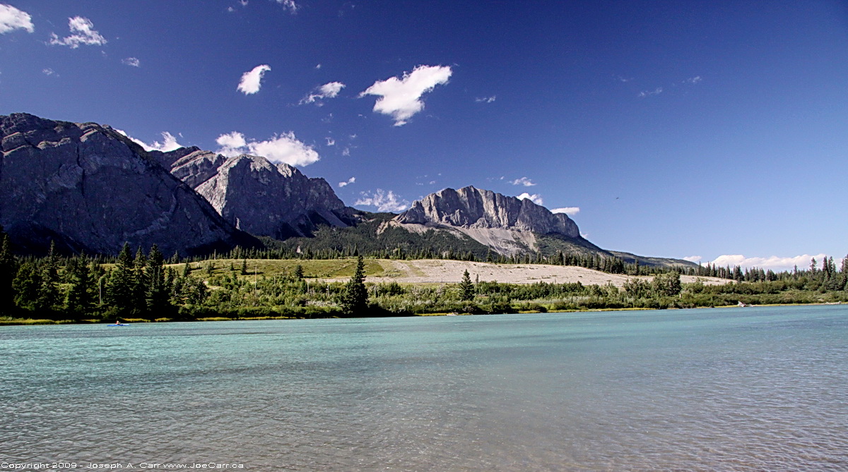 The Rocky Mountains across the Bow River in the Kananaskis, Alberta