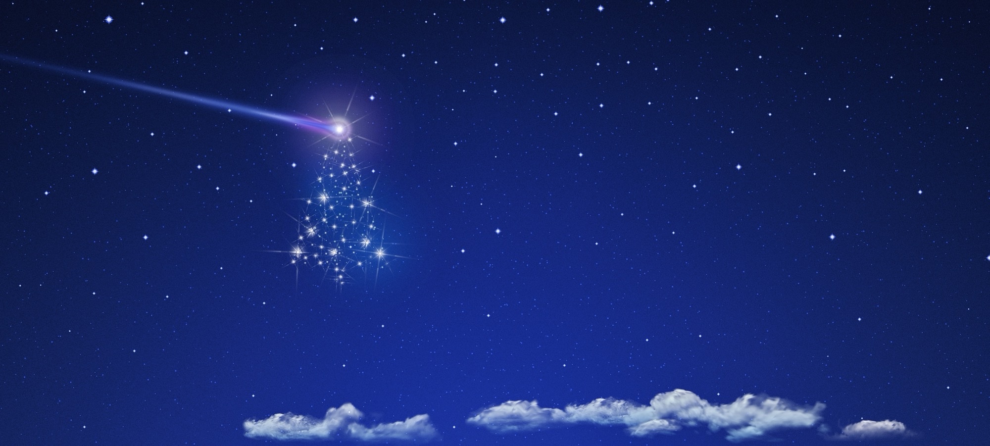 Comet tree topper in a starry sky