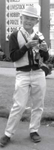 Joe Carr holding his first camera (a Grace) at the PNE in 1965